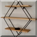 D09. Metal and wood wall shelf. 